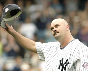 September 28, 2003.  Boomer doffs his cap, and waves to the fans who gave him a standing ovation as he left the field on the way to his 200th win.  Boomer was perfect back in 1998, and now in the year 2003 he has become the 99th member of the 200 career Wins Pitcher Club.  Boomer has earned a permanent place in the hearts of Yankee fans.