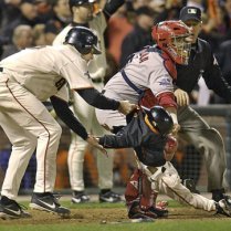 ...the best play ever made in Baseball to save a 3 year old's life!  Giants' 1B J.T. Snow grabs Darren Baker, the 3 year-old son of Giants Manager Dusty Baker, saving him from being trampled as the Giants win Game 5.